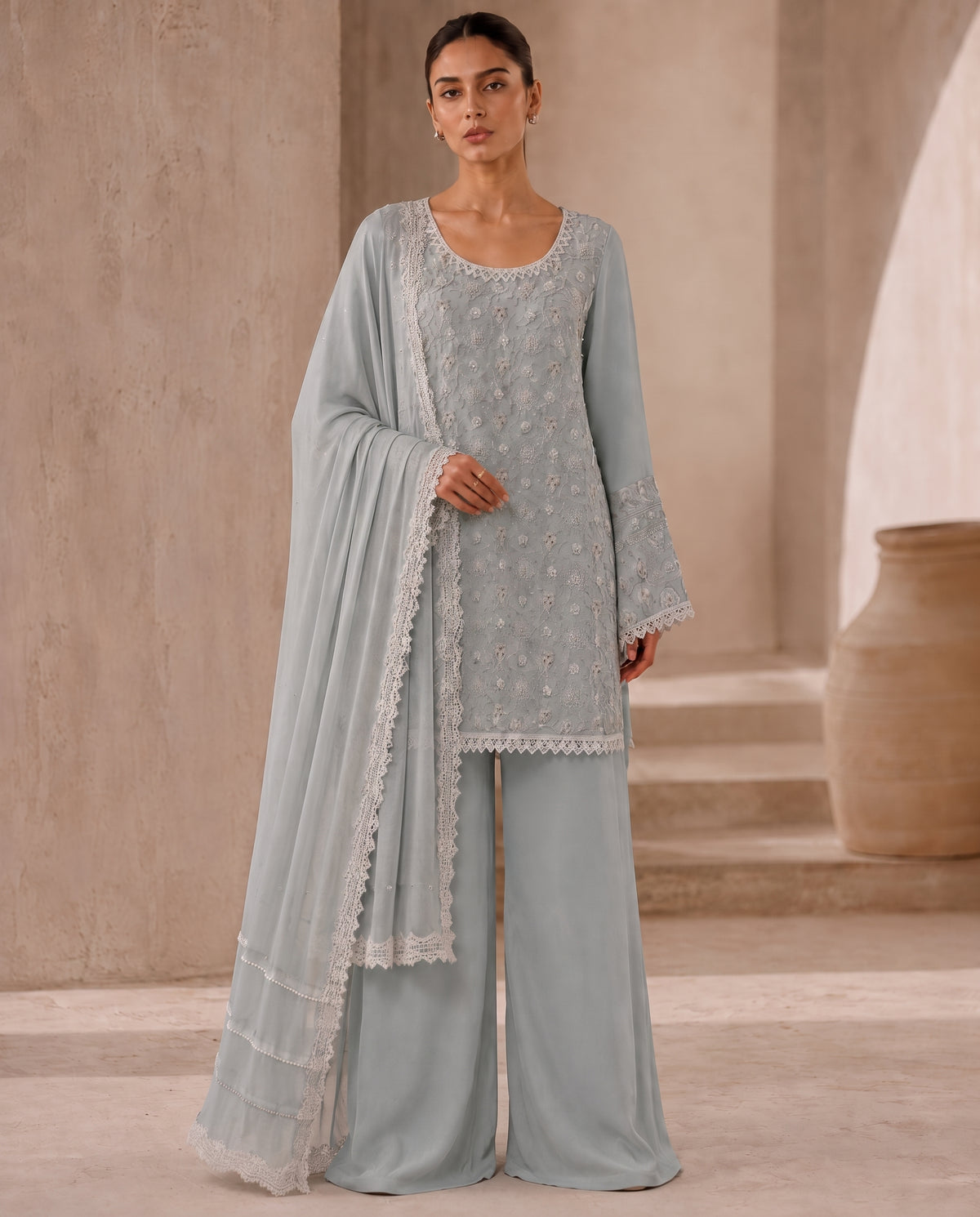 Ash Blossom, an ash blue embroidered tunic set by Jannat and Sadaf
