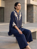 Blue Roses, an embroidered ocean blue raw silk co-ord by Jannat and Sadaf