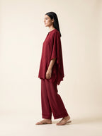 Cape Set, a maroon textured crepe cape set by Jannat and Sadaf