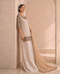 Motiya, an ivory organza and raw silk ensemble by Jannat and Sadaf