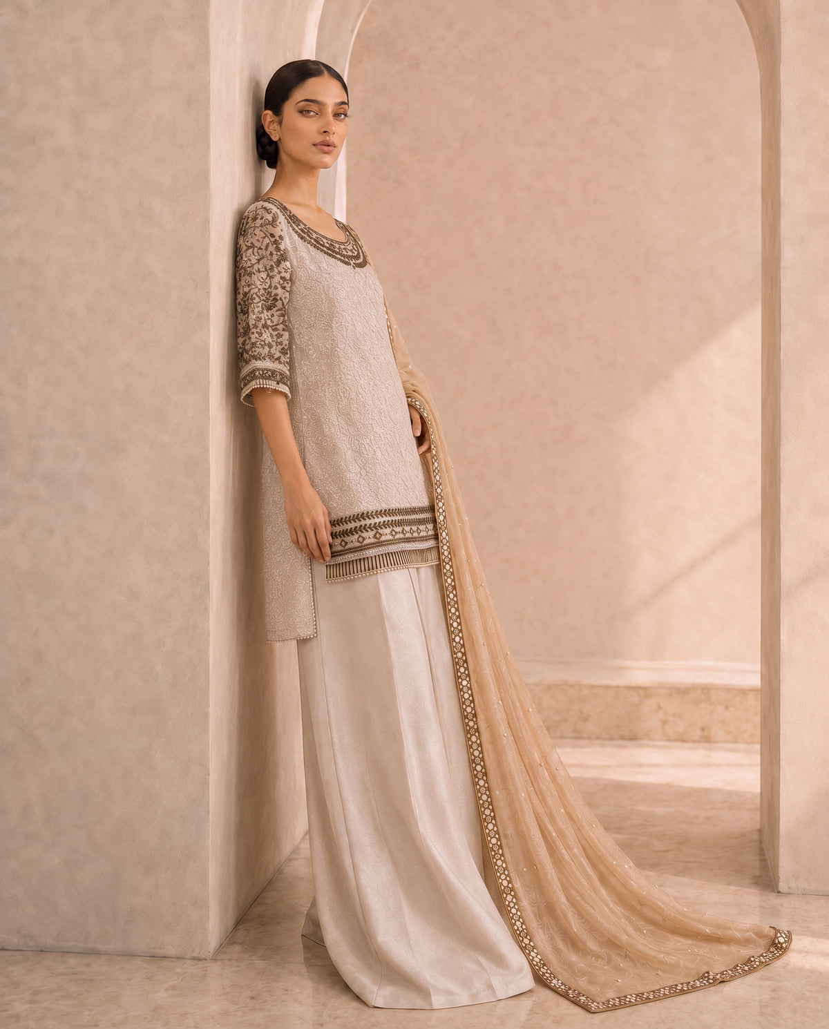 Motiya, an ivory organza and raw silk ensemble by Jannat and Sadaf
