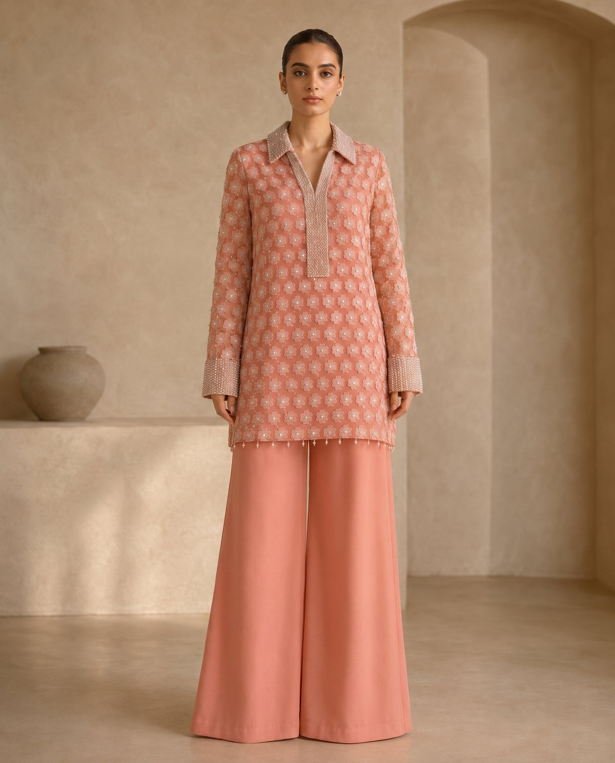 Peach Floret, a peach embellished net tunic by Jannat and Sadaf