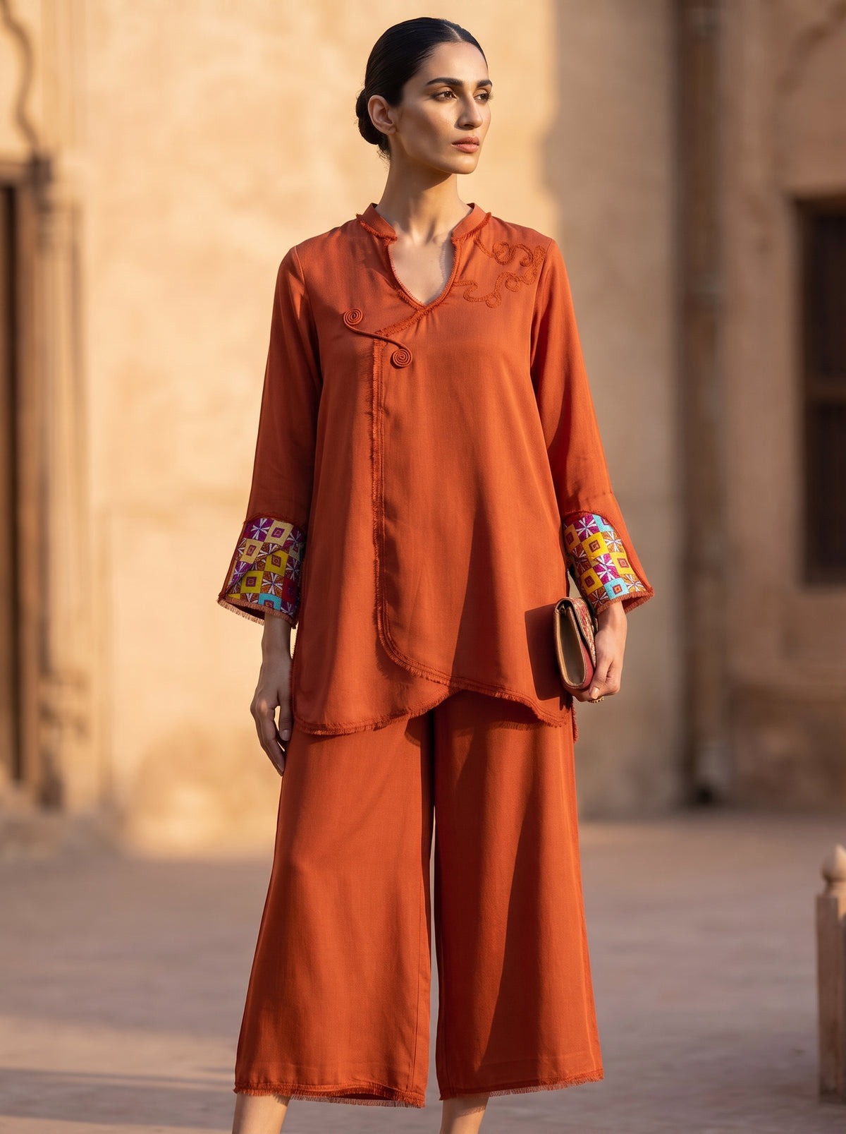 Rust Scroll, a rust silk co-ord set by Jannat and Sadaf