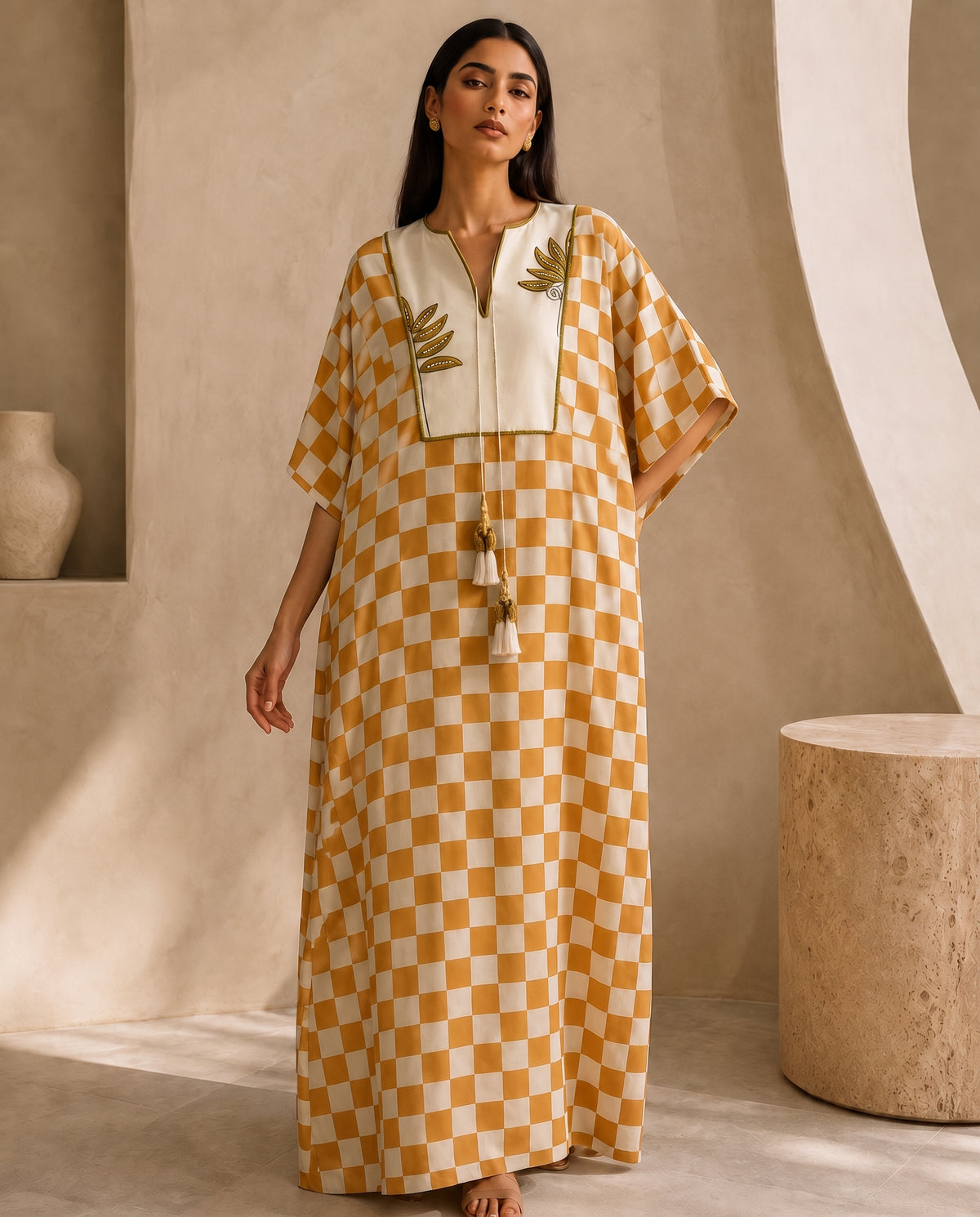 Saffron Check, a mustard block print silk kaftan by Jannat and Sadaf