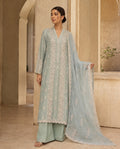 Sea Mist, a hand embroidered ash blue khaddi silk set by Jannat and Sadaf