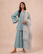 Serenade Blue, a powder blue khaddi silk three piece set by Jannat and Sadaf