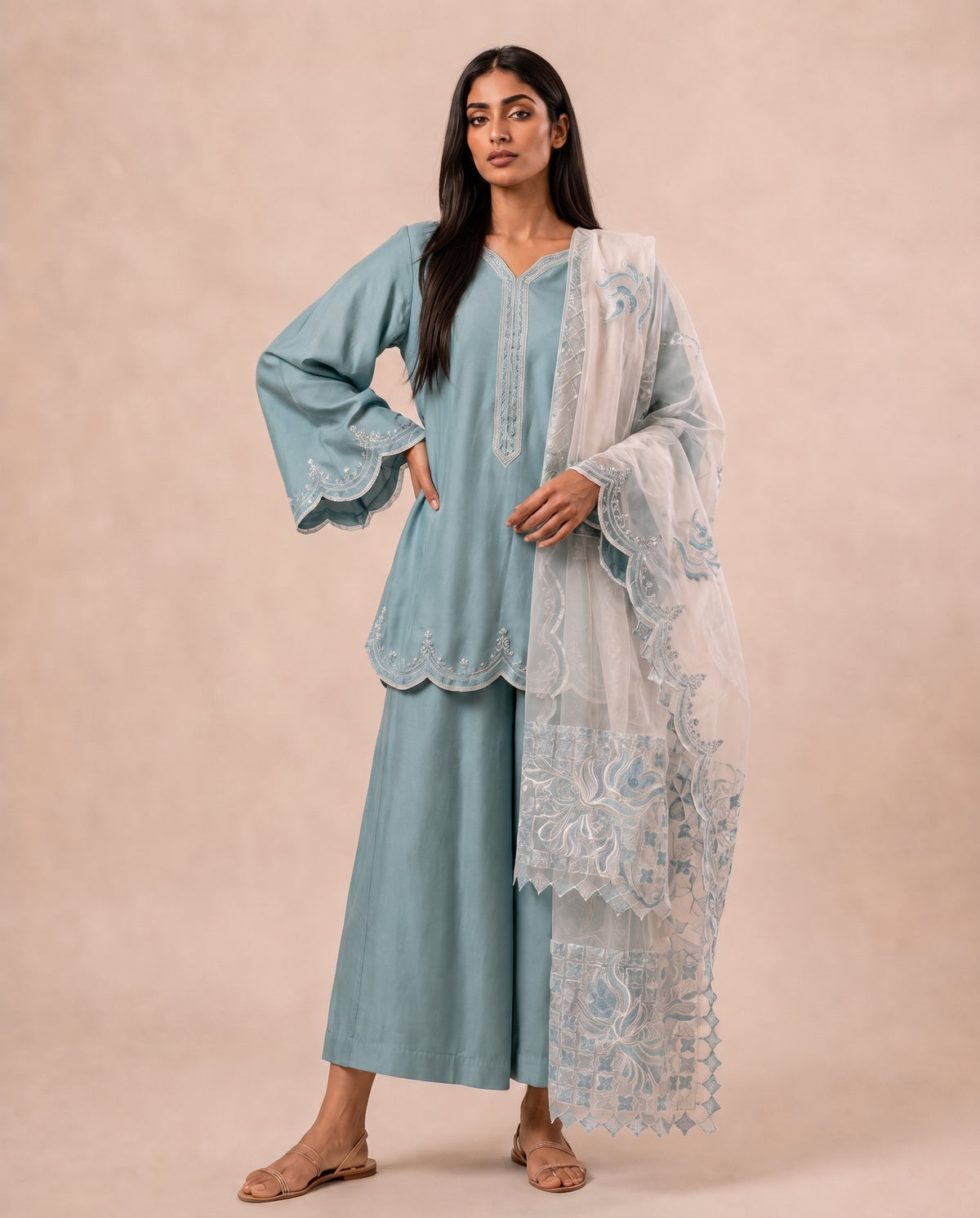 Serenade Blue, a powder blue khaddi silk three piece set by Jannat and Sadaf
