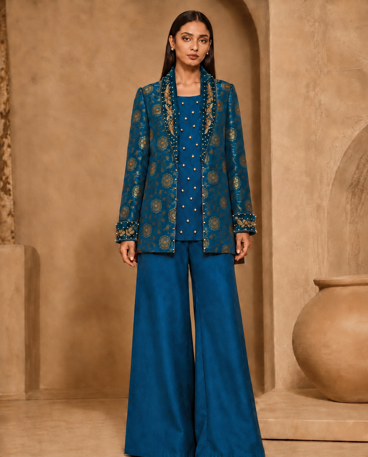 Teal Brocade, a teal embroidered brocade jacket set by Jannat and Sadaf